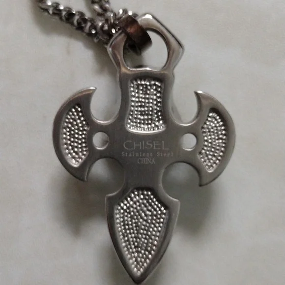 Chisel stainless steel skull pendant and chain necklace.